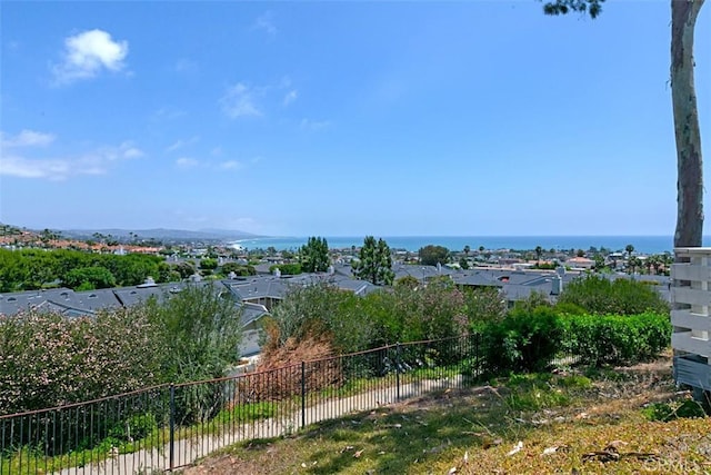 view of water feature featuring fence