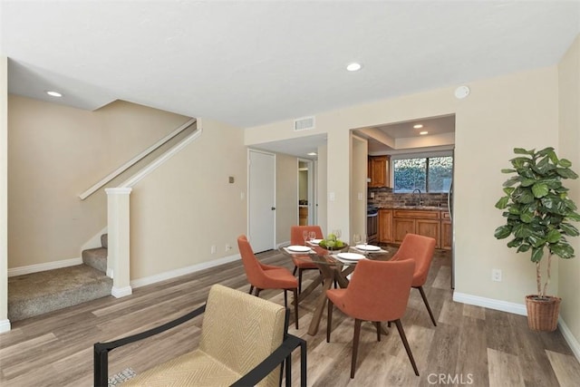 33611 Dana Vista Dr Unit 31, Dana Point, CA 92629 - dining room with light wood finished floors, stairway, and recessed lighting