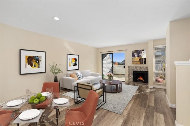 33611 Dana Vista Dr Unit 31, Dana Point, CA 92629 - living area with wood finished floors, a warm lit fireplace, and recessed lighting
