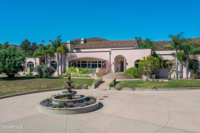 view of mediterranean / spanish house