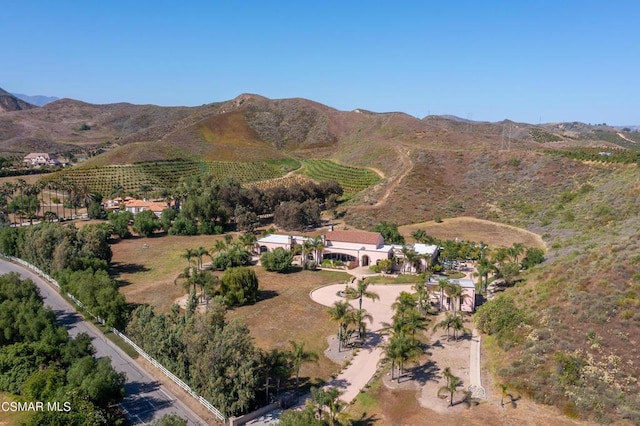 birds eye view of property with a rural view and a mountain view