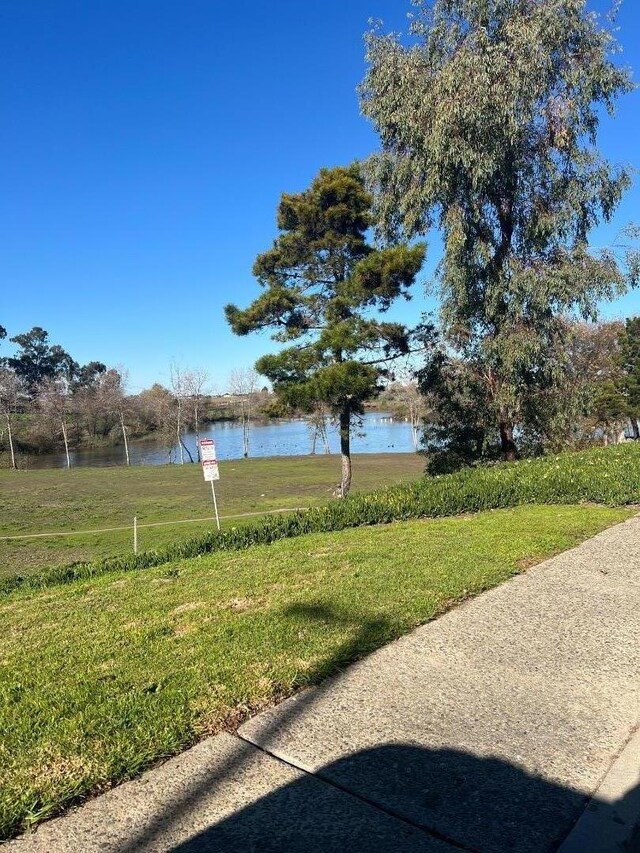 view of yard with a water view