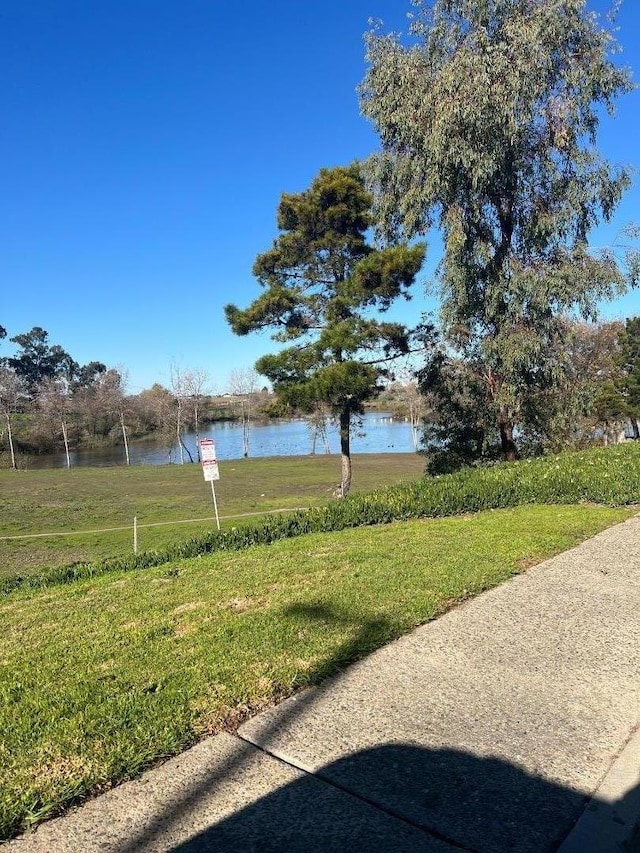 view of yard with a water view