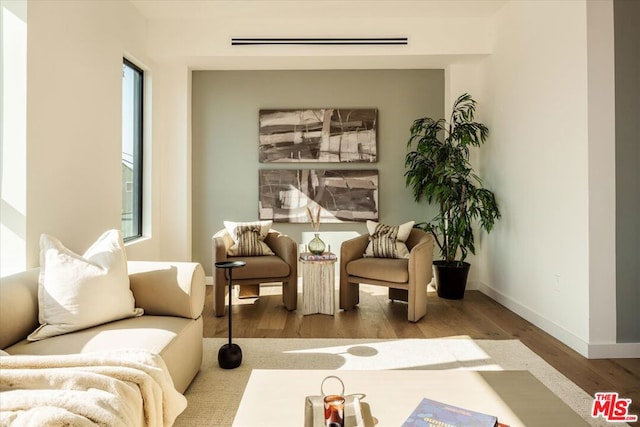 living area featuring light hardwood / wood-style floors