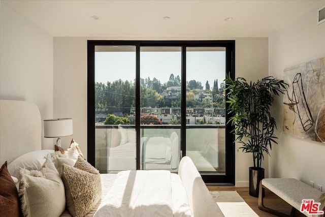 bedroom featuring hardwood / wood-style floors