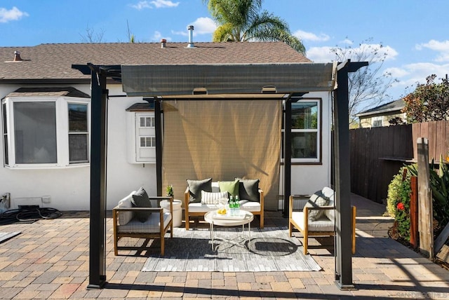 view of patio / terrace with an outdoor hangout area and a pergola