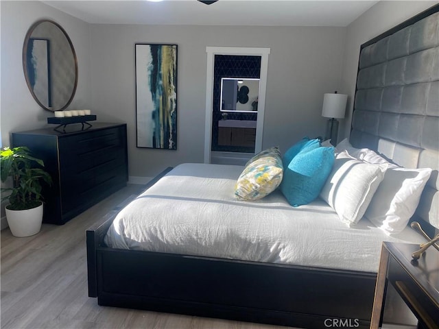 bedroom featuring light hardwood / wood-style floors