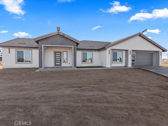 ranch-style home with a garage