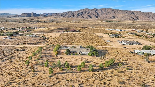 bird's eye view with a mountain view