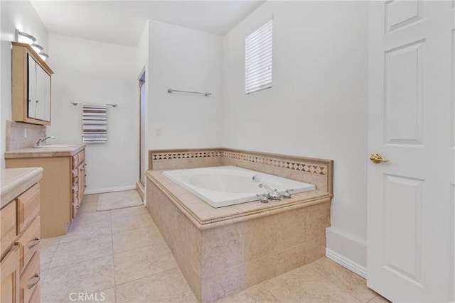 bathroom with tile patterned flooring, separate shower and tub, and vanity