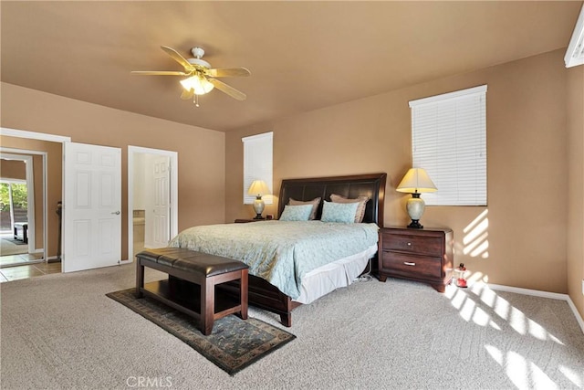 bedroom with ceiling fan, access to outside, and carpet floors