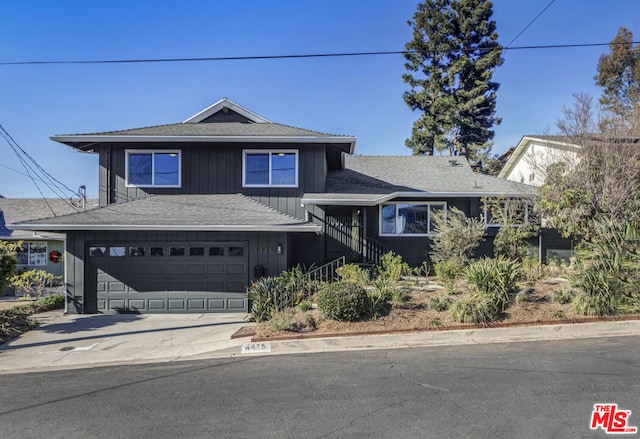 view of front of property featuring a garage