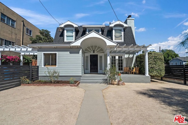 view of front of house featuring a pergola