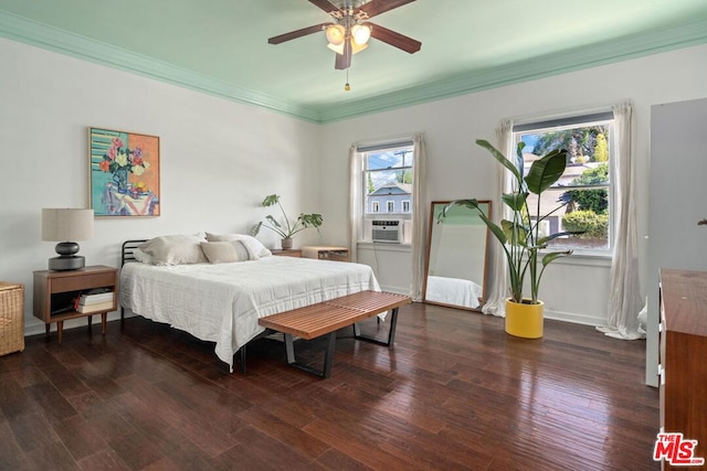 bedroom with ceiling fan, cooling unit, dark hardwood / wood-style floors, and ornamental molding