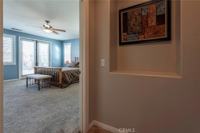 bedroom featuring ceiling fan and carpet flooring