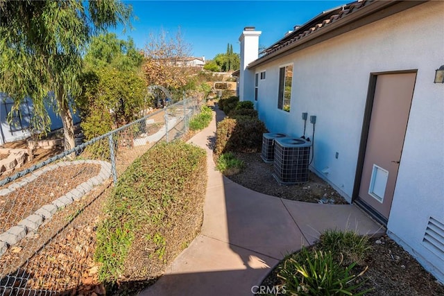 view of yard featuring central AC