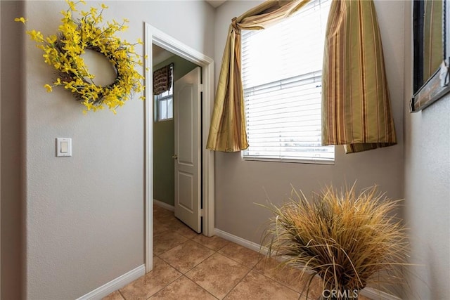 bathroom featuring tile patterned flooring