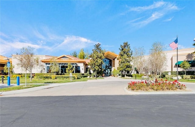 exterior space with concrete driveway