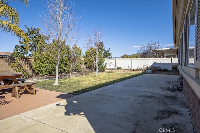 view of patio featuring outdoor dining space and a fenced backyard