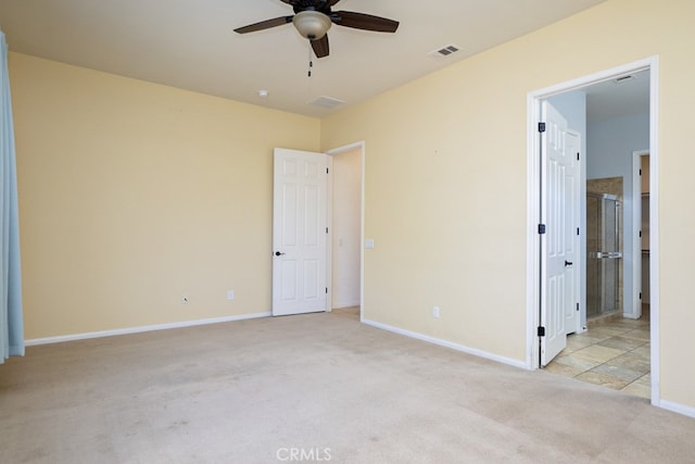 unfurnished bedroom with visible vents, ceiling fan, light carpet, and baseboards