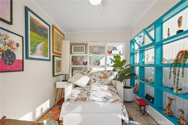 tiled bedroom featuring ceiling fan, crown molding, and a wall mounted air conditioner