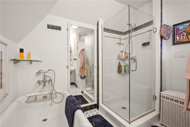 bathroom with a shower with shower door