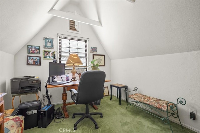 office space with vaulted ceiling and carpet