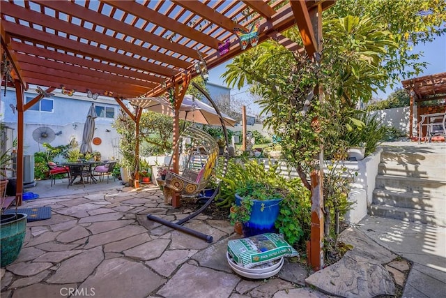 view of patio featuring a pergola