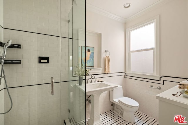 bathroom featuring toilet, tile walls, tile patterned floors, an enclosed shower, and crown molding