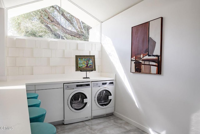 laundry room featuring washing machine and dryer