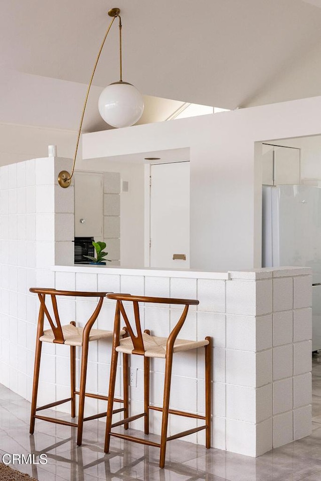 kitchen with white fridge