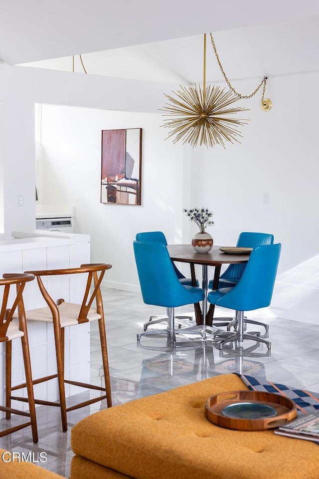 dining area with a chandelier