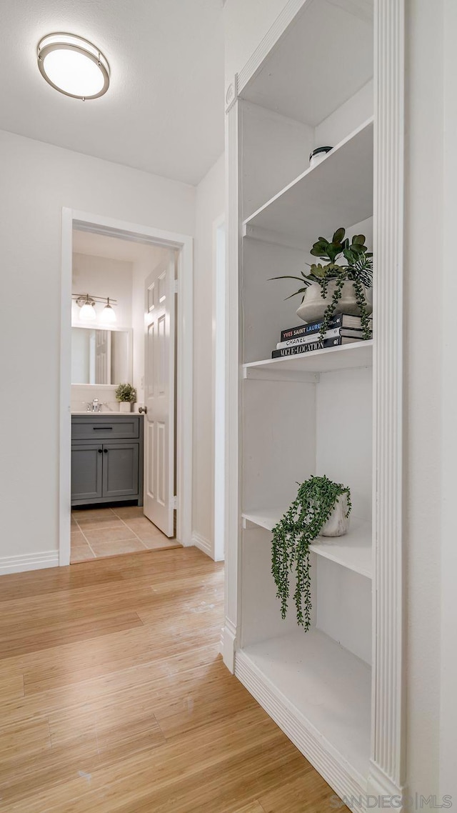 corridor featuring light hardwood / wood-style flooring