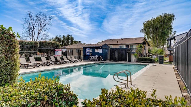 view of pool featuring a patio area