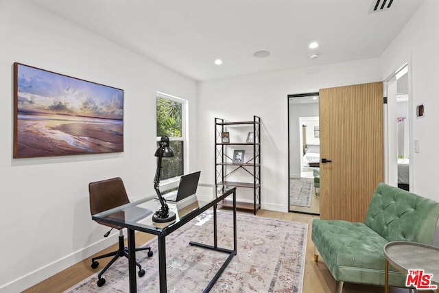 office featuring light hardwood / wood-style flooring