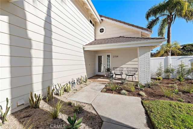 entrance to property with covered porch