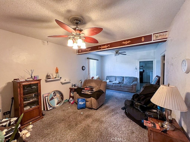 interior space with ceiling fan, carpet flooring, and a textured ceiling