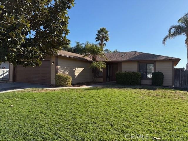 ranch-style home with a front lawn