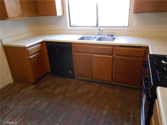 kitchen with sink and black appliances