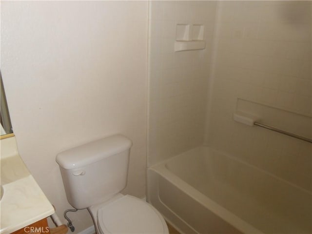 full bathroom featuring vanity, shower / tub combination, and toilet