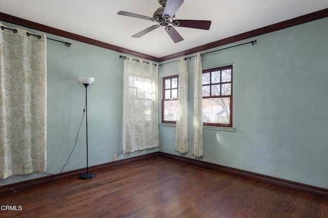 unfurnished room with ceiling fan, dark hardwood / wood-style floors, and ornamental molding