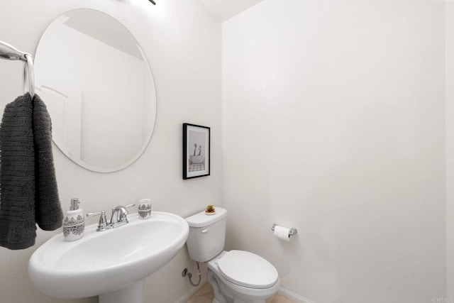 bathroom with sink and toilet