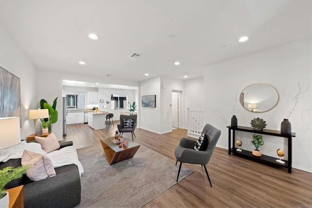 living room featuring light hardwood / wood-style floors