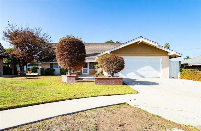 single story home with a front lawn and a garage