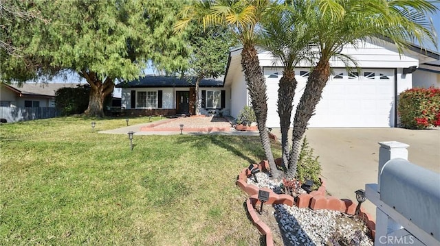 ranch-style home with a garage and a front yard