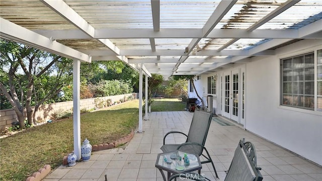 view of patio with a pergola and french doors