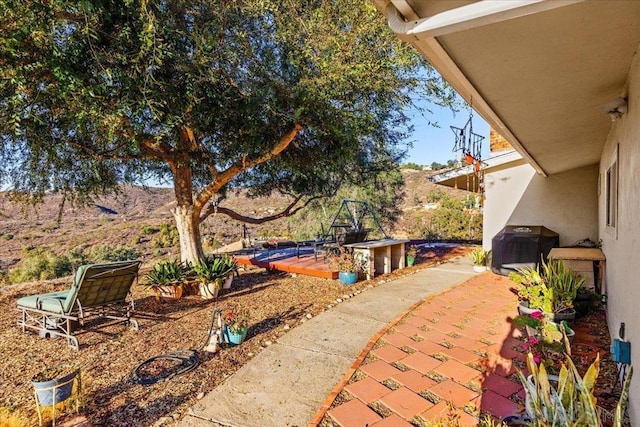 view of patio / terrace featuring a grill