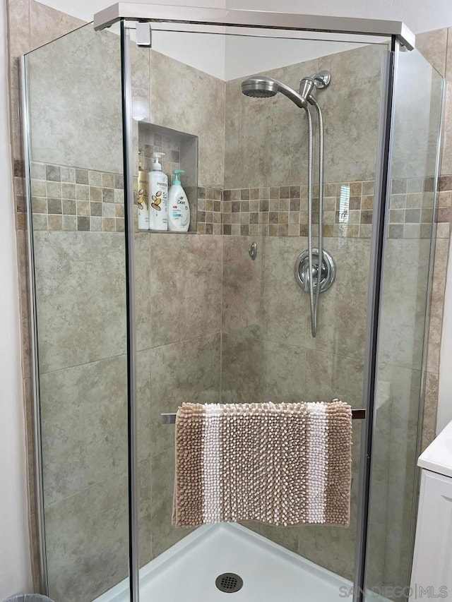 bathroom featuring walk in shower