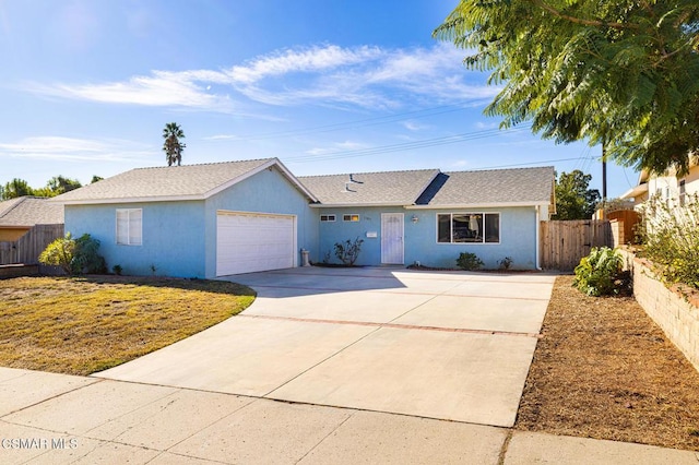 single story home featuring a garage