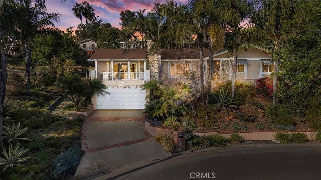 view of front of property featuring a garage